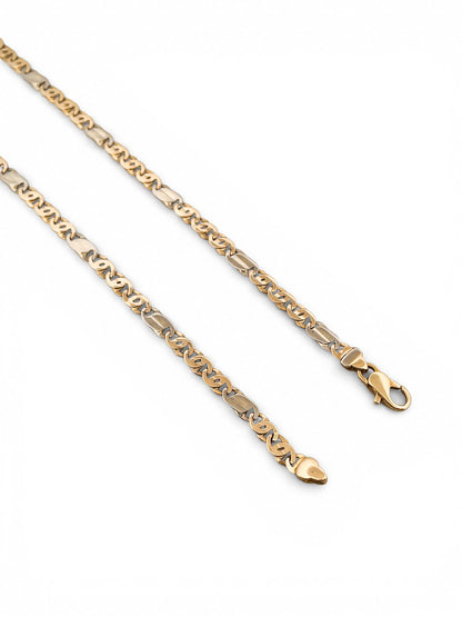 Comprar collar cadena eslabones ojo de lince, intercalando oro amarillo de 18kt y oro blanco y cierre tipo mosquetón. Joyería Ian'Or.