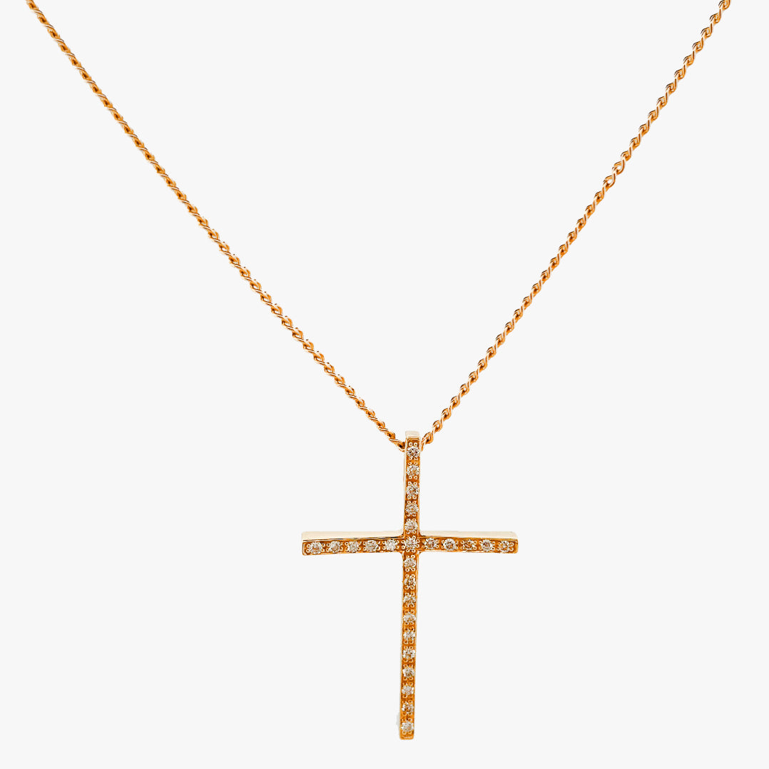 Comprar colgante en forma de cruz con 26 diamantes talla brillante realizada en oro amarillo de 18kt. Cruces de oro y diamantes 18kt baratas