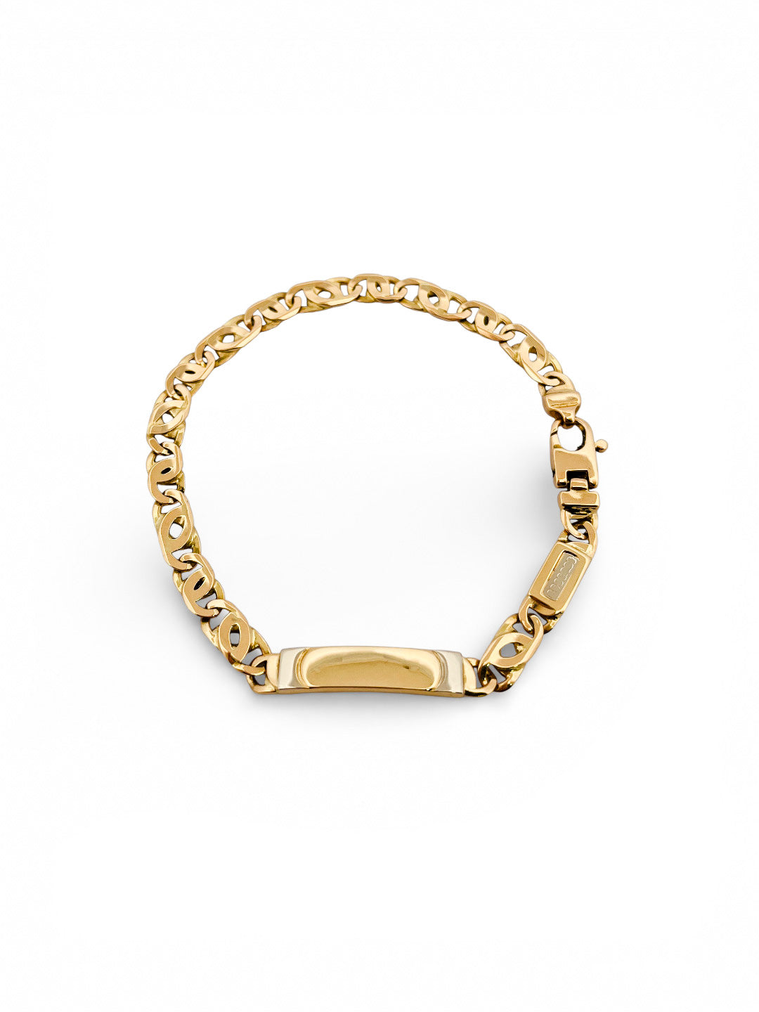 Comprar pulsera no me olvides realizada oro amarillo de 18kt con cadena tipo ojo de lince y una placa. Esta pulsera dispone de cierre tipo mosquetón.Esclavas de oro 18kt baratas.