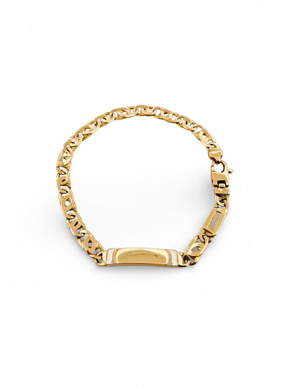 Comprar pulsera no me olvides realizada oro amarillo de 18kt con cadena tipo ojo de lince y una placa. Esta pulsera dispone de cierre tipo mosquetón.Esclavas de oro 18kt baratas.