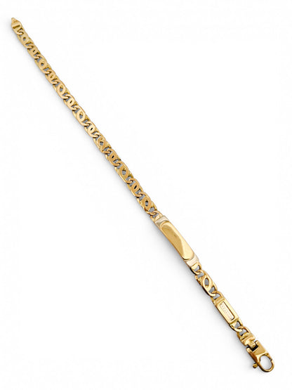 Comprar pulsera no me olvides realizada oro amarillo de 18kt con cadena tipo ojo de lince y una placa. Esta pulsera dispone de cierre tipo mosquetón.Esclavas de oro 18kt baratas.