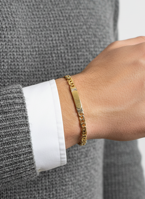 Comprar pulsera no me olvides realizada oro amarillo de 18kt con cadena tipo ojo de lince y una placa. Esta pulsera dispone de cierre tipo mosquetón.Esclavas de oro 18kt baratas.