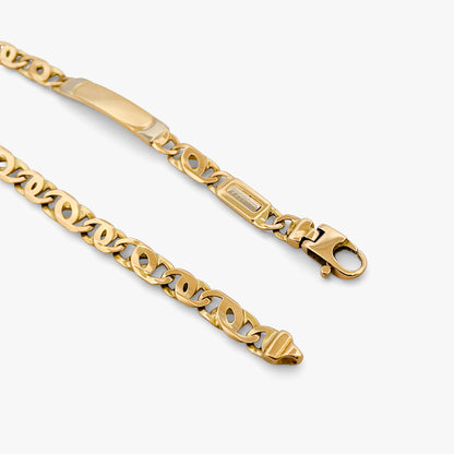 Comprar pulsera no me olvides realizada oro amarillo de 18kt con cadena tipo ojo de lince y una placa. Esta pulsera dispone de cierre tipo mosquetón.Esclavas de oro 18kt baratas.