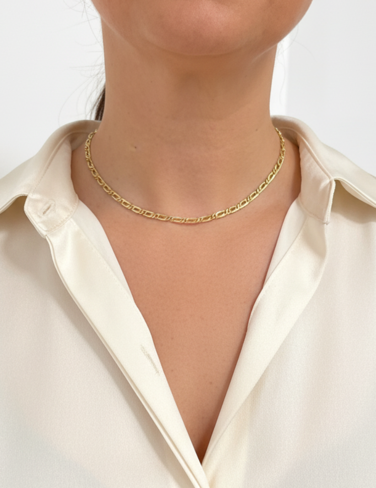 Comprar cadena realizada en oro amarillo de 18kt con eslabones ojo de tigre y cierre tipo mosquetón. Joyas restauradas. Cadenas de oro de 18kt