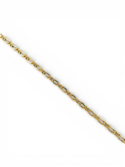 Comprar cadena realizada en oro amarillo de 18kt con eslabones ojo de tigre y cierre tipo mosquetón. Joyas restauradas. Cadenas de oro de 18kt