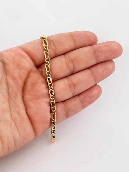 Comprar cadena realizada en oro amarillo de 18kt con eslabones ojo de tigre y cierre tipo mosquetón. Joyas restauradas. Cadenas de oro de 18kt