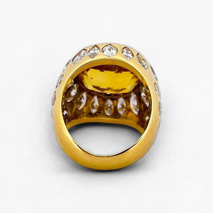 Comprar anillo realizado en oro amarillo de 18kt con citrino central y diamantes talla brillante y marquesa alrededor de el y en los brazos. Envío GRATIS.