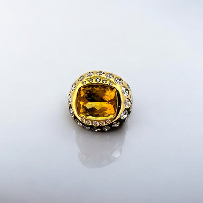 Comprar anillo realizado en oro amarillo de 18kt con citrino central y diamantes talla brillante y marquesa alrededor de el y en los brazos. Envío GRATIS.
