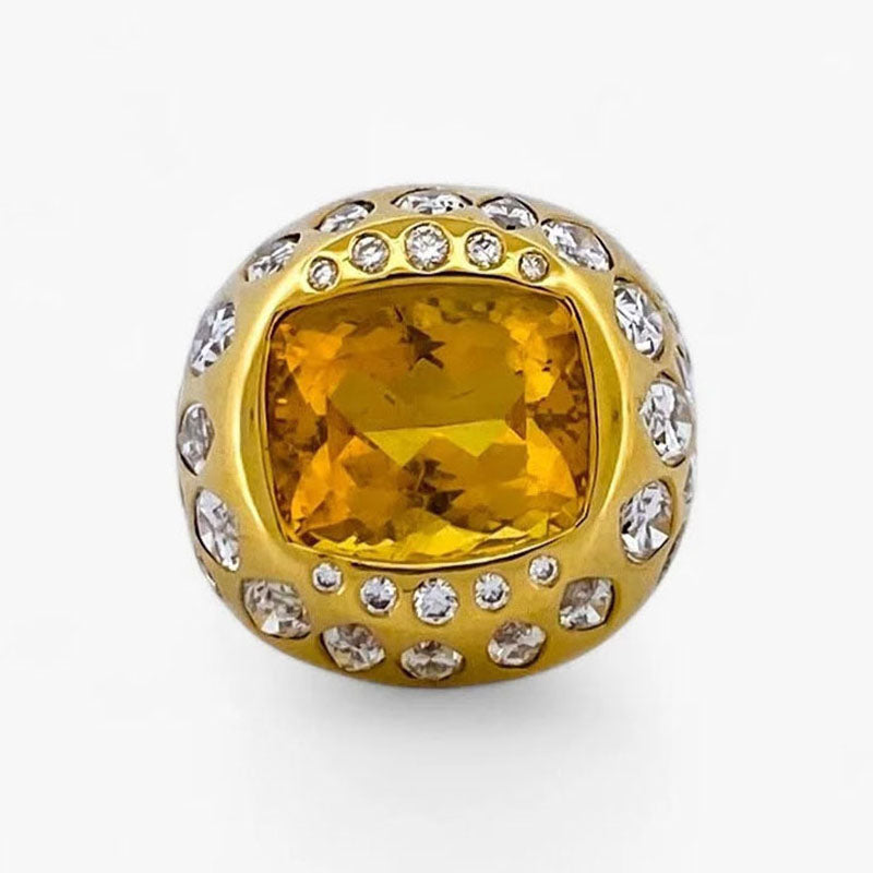Comprar anillo realizado en oro amarillo de 18kt con citrino central y diamantes talla brillante y marquesa alrededor de el y en los brazos. Envío GRATIS.