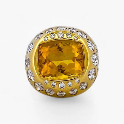 Comprar anillo realizado en oro amarillo de 18kt con citrino central y diamantes talla brillante y marquesa alrededor de el y en los brazos. Envío GRATIS.