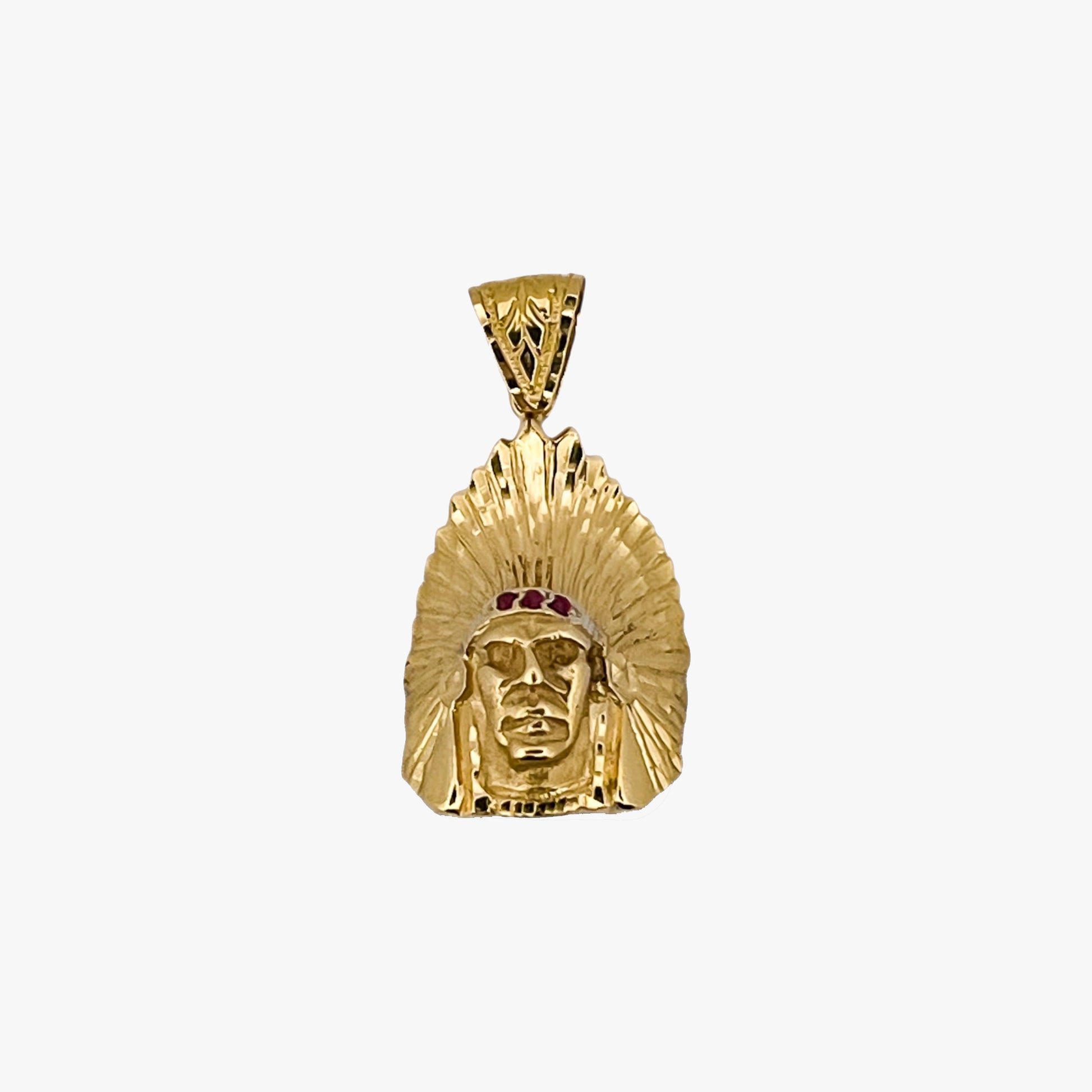 Comprar colgante medalla con cabeza de indio realizado en oro amarillo de 18kt con rubís. Colgantes de oro indios baratos. Pieza certificada y envío gratuito