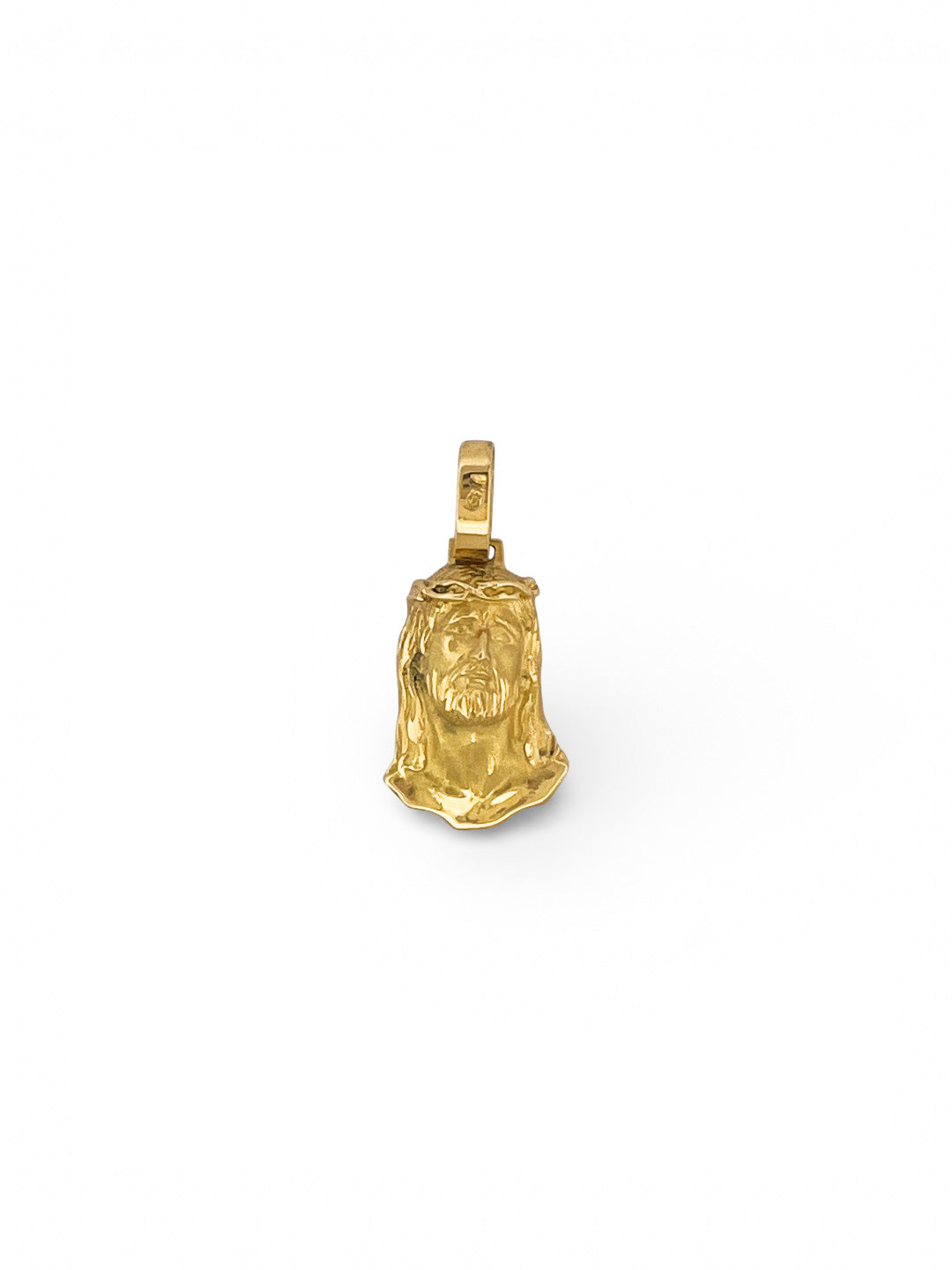 Comprar colgante medalla tipo cara de cristo realizado en oro amarillo de 18kt. Joyeria religiosa.