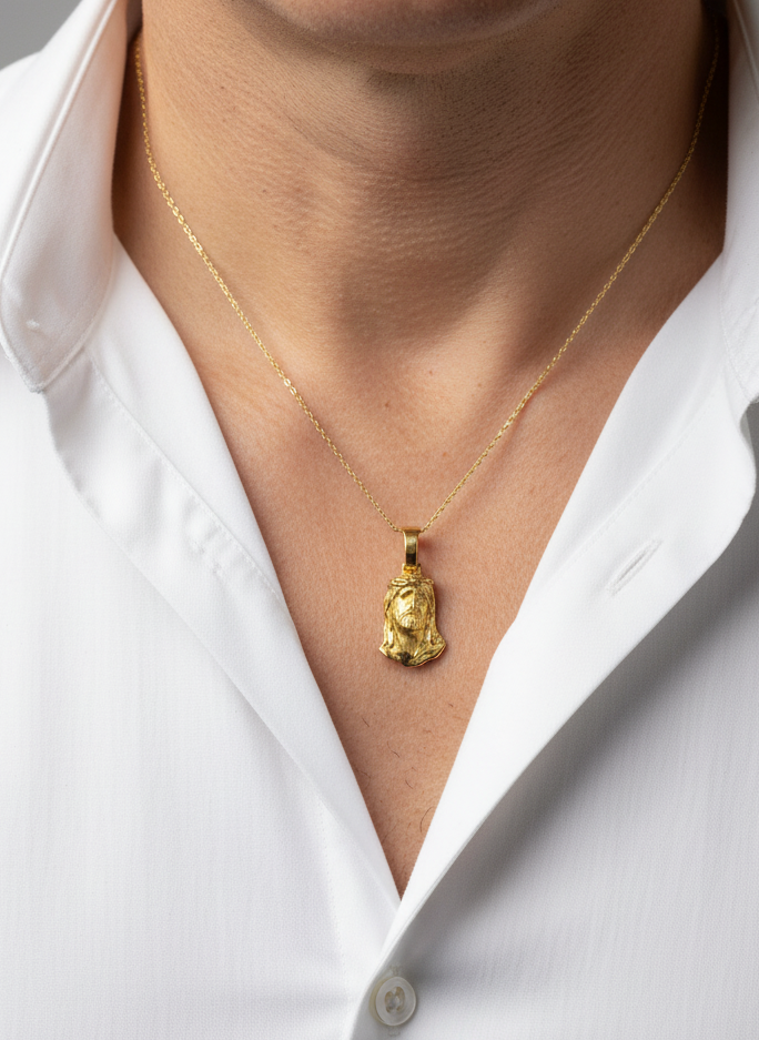 Comprar colgante medalla tipo cara de cristo realizado en oro amarillo de 18kt. Joyeria religiosa.