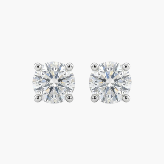 Comprar pendientes tipo dormilonas realizados en oro blanco de 18kt y brillantes con engaste en chatón.  Criollas de oro blanco y diamantes al mejor precio.
