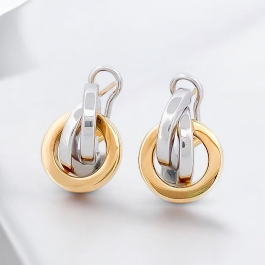 Comprar pendientes de oro blanco y amarillo de 18kt en formas circulares. Cierre Omega. Pendientes de oro baratos Ian'Or. Pendientes oro 18kt. Envío gratis. 