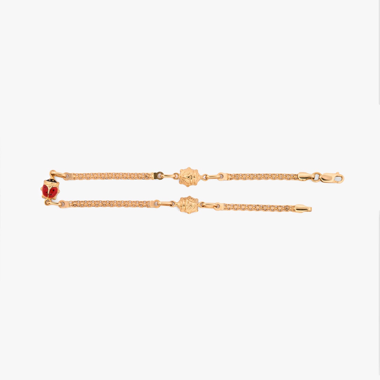 comprar Pulsera bismark de oro amarillo de 18Kt y cierre tipo mosquetón con tres mariquitas con esmalte rojo y negro. Envío gratuito