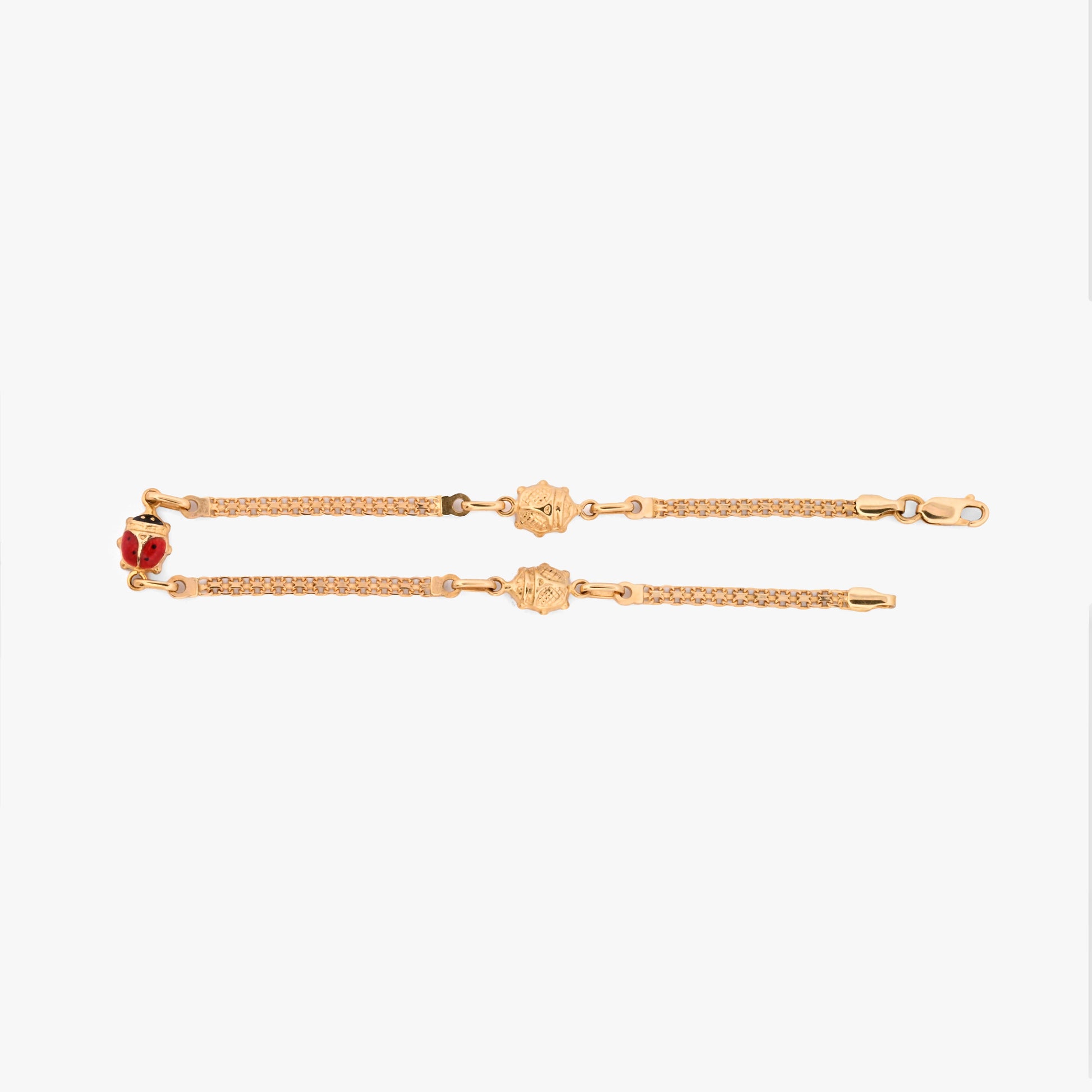 comprar Pulsera bismark de oro amarillo de 18Kt y cierre tipo mosquetón con tres mariquitas con esmalte rojo y negro. Envío gratuito
