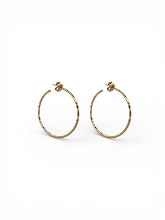 Comprar pendientes aro lisos en oro amarillo de 18kt de 40mm de diámetro y 1,66mm de grosor. Estos pendientes disponen de cierre por presión Joyería Ian'Or. Envío GRATIS. Ian'Or.