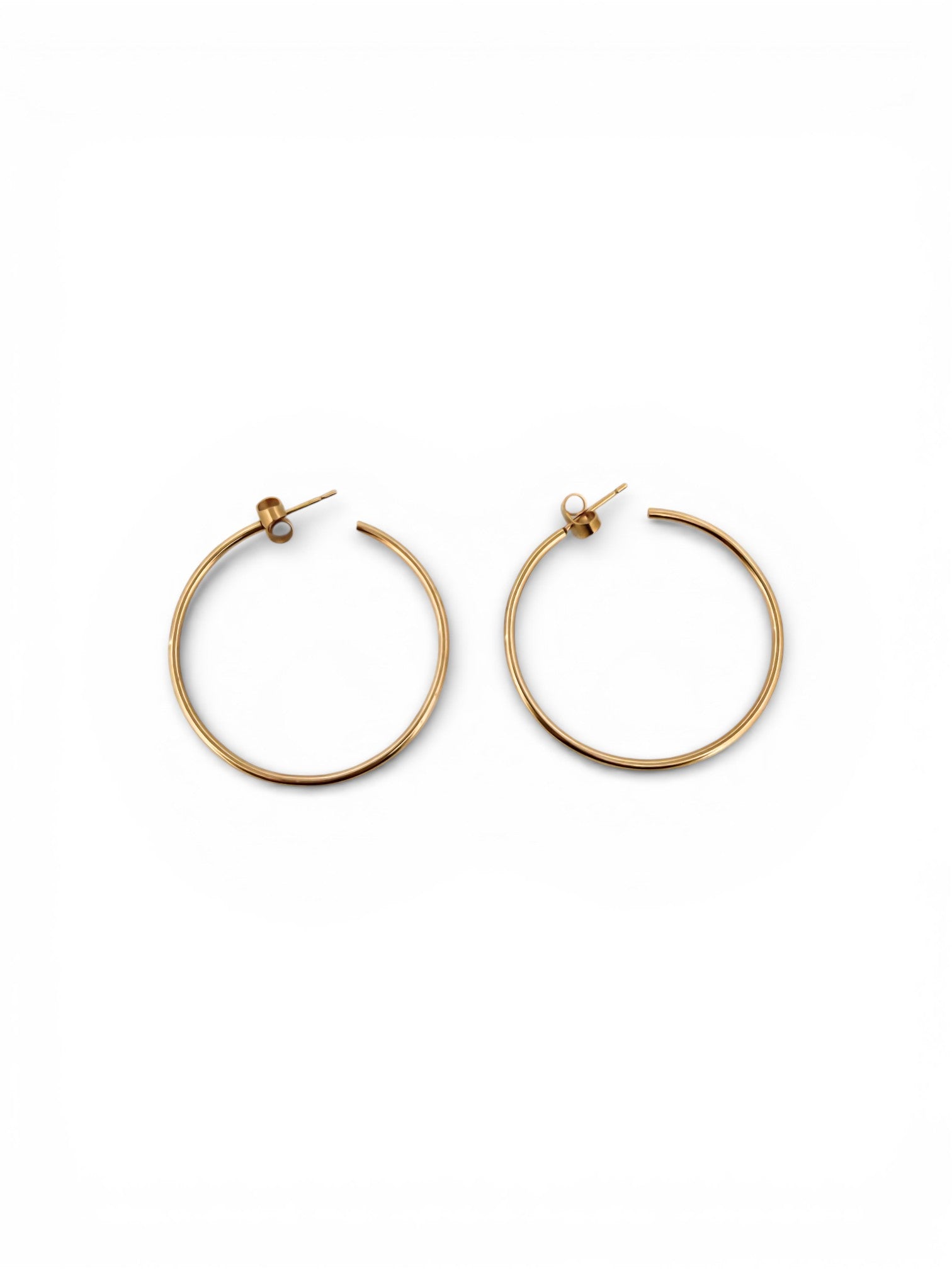 Comprar pendientes aro lisos en oro amarillo de 18kt de 40mm de diámetro y 1,66mm de grosor. Estos pendientes disponen de cierre por presión Joyería Ian'Or. Envío GRATIS. Ian'Or.