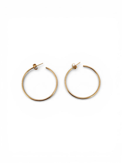 Comprar pendientes aro lisos en oro amarillo de 18kt de 40mm de diámetro y 1,66mm de grosor. Estos pendientes disponen de cierre por presión Joyería Ian'Or. Envío GRATIS. Ian'Or.