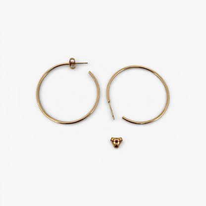 Comprar pendientes aro lisos en oro amarillo de 18kt de 40mm de diámetro y 1,66mm de grosor. Estos pendientes disponen de cierre por presión Joyería Ian'Or. Envío GRATIS. Ian'Or.