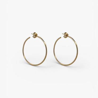 Comprar pendientes aro lisos en oro amarillo de 18kt de 40mm de diámetro y 1,66mm de grosor. Estos pendientes disponen de cierre por presión Joyería Ian'Or. Envío GRATIS. Ian'Or.