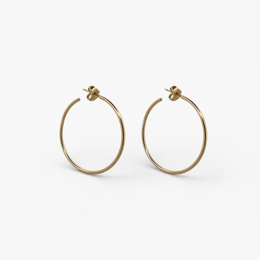 Comprar pendientes aro lisos en oro amarillo de 18kt de 40mm de diámetro y 1,66mm de grosor. Estos pendientes disponen de cierre por presión Joyería Ian'Or. Envío GRATIS. Ian'Or.