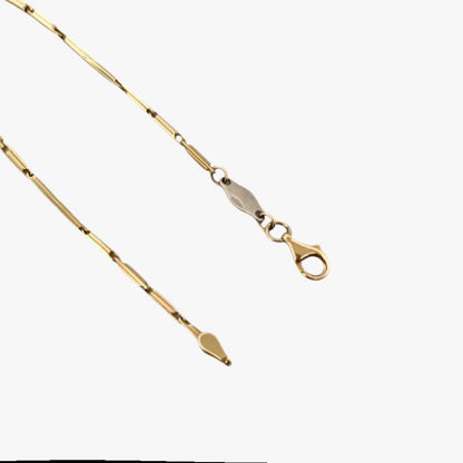 Comprar pulsera oro amarillo de 18kt con cadena de eslabones barra. La pulsera mide 18,5cm y hace 1,69mm de grosor. Esta pulsera dispone de cierre tipo mosquetón.