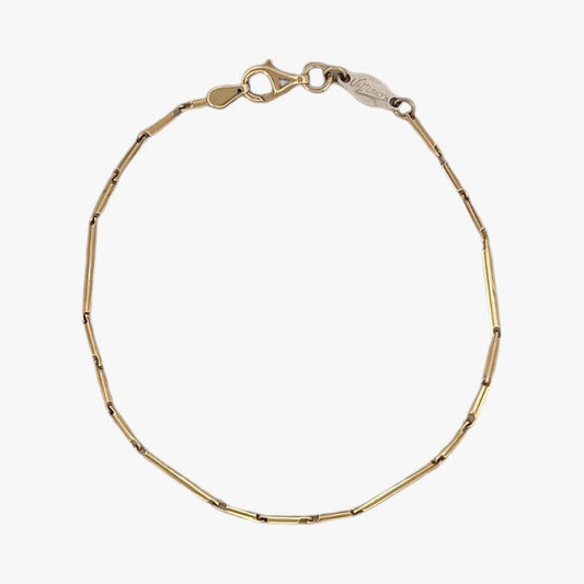 Comprar pulsera oro amarillo de 18kt con cadena de eslabones barra. La pulsera mide 18,5cm y hace 1,69mm de grosor. Esta pulsera dispone de cierre tipo mosquetón.