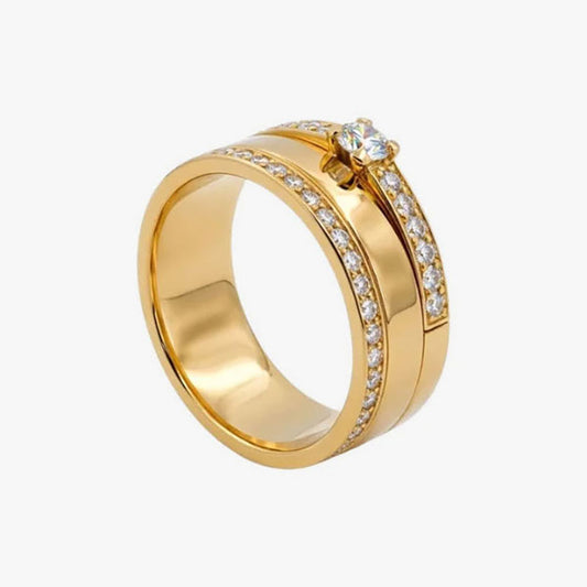 Comprar anillo realizado en oro amarillo de 18kt con un diamante engastado en 4 grapas y 54 diamantes más pequeños. Joyas segunda mano. Joyería Ian'Or.