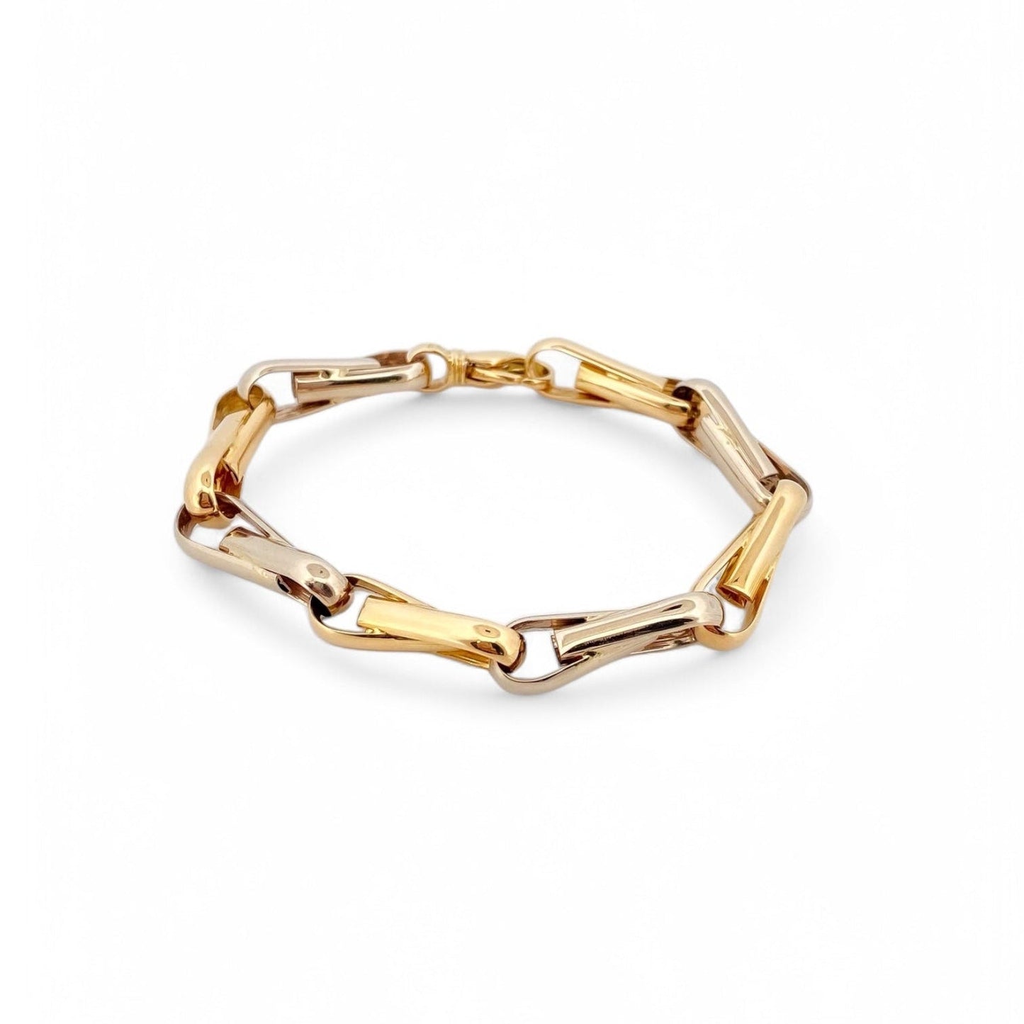 Pulsera de eslabones bicolor en oro blanco y amarillo de 18Kt de 19cm de largo y cierre tipo mosquetón. Pulseras de oro baratas Barcelona. Joyería Ian'Or.