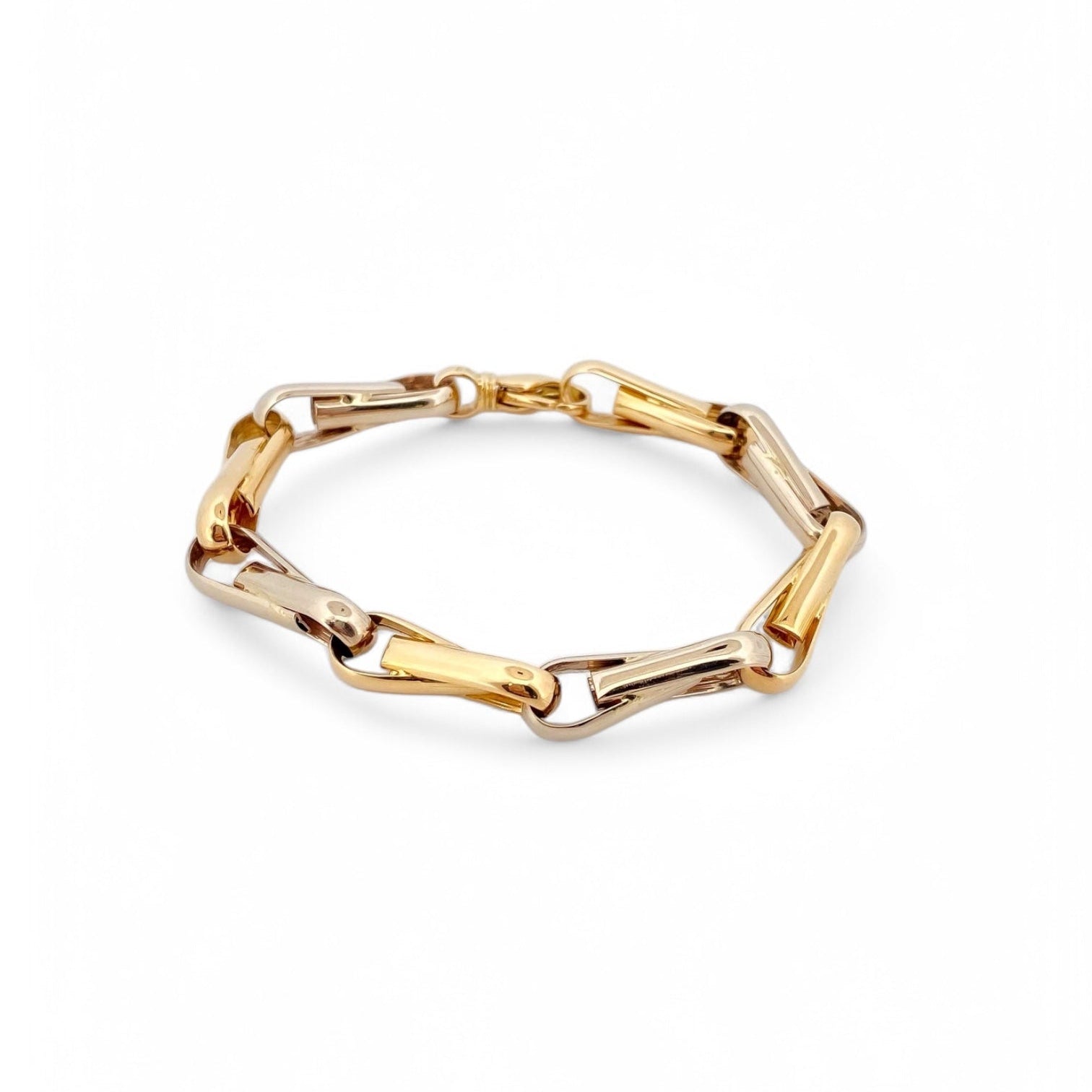 Pulsera de eslabones bicolor en oro blanco y amarillo de 18Kt de 19cm de largo y cierre tipo mosquetón. Pulseras de oro baratas Barcelona. Joyería Ian'Or.