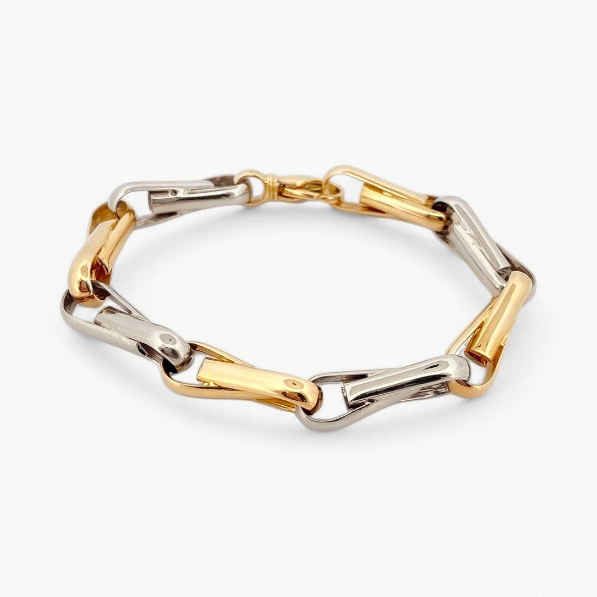 Comprar pulsera de eslabones bicolor en oro blanco y amarillo de 18Kt de 19cm de largo y cierre tipo mosquetón. Pulseras de oro baratas Barcelona. Joyería Ian'Or.