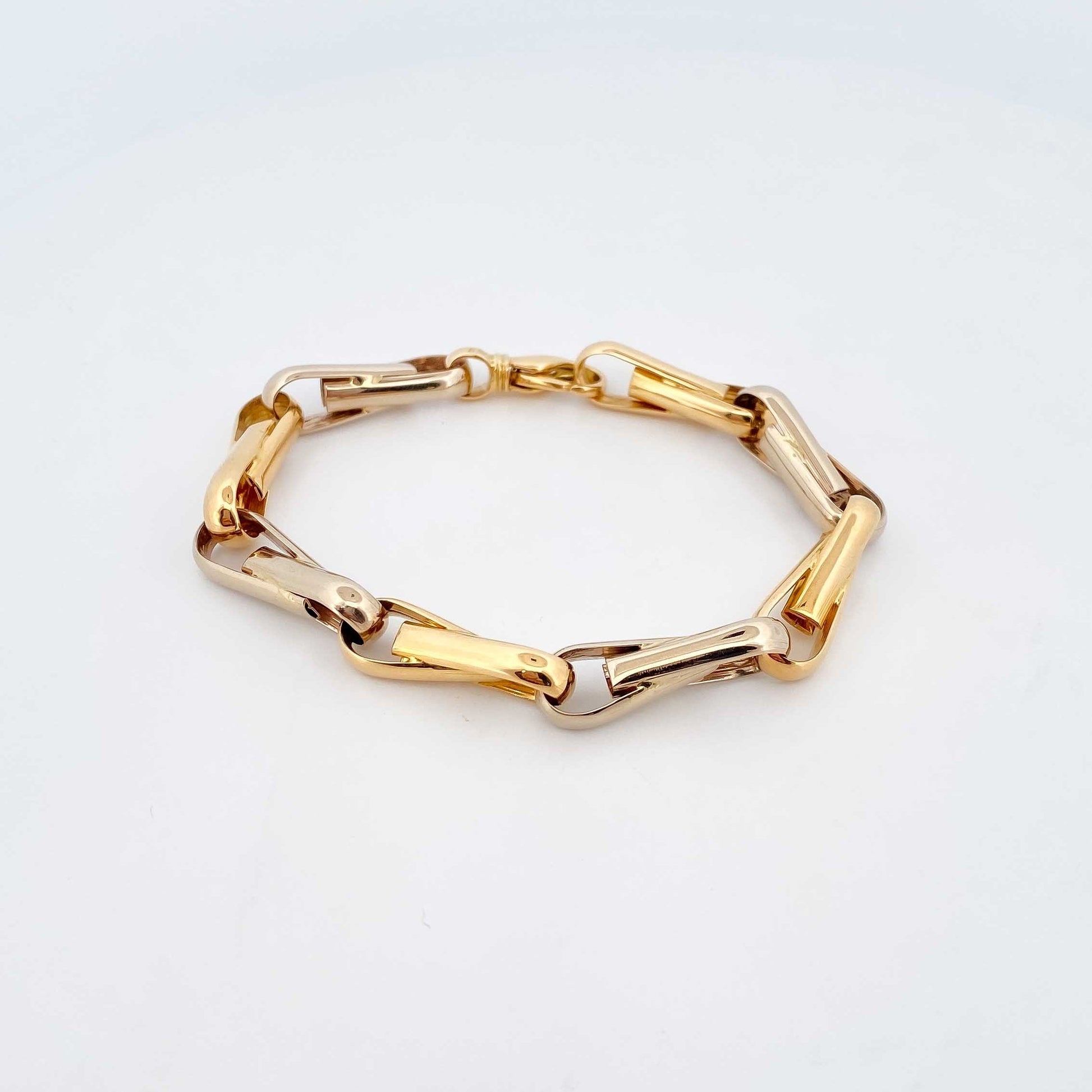 Pulsera de eslabones bicolor en oro blanco y amarillo de 18Kt de 19cm de largo y cierre tipo mosquetón. Pulseras de oro baratas Barcelona. Joyería Ian'Or.