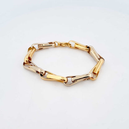 Pulsera de eslabones bicolor en oro blanco y amarillo de 18Kt de 19cm de largo y cierre tipo mosquetón. Pulseras de oro baratas Barcelona. Joyería Ian'Or.