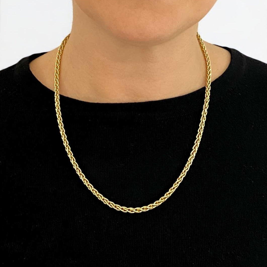 Cadena de oro amarillo de 18kt de cordón con eslabones palmera. La cadena mide 52,4cm de largo y 3,9mm de grosor y dispone de un cierre tipo mosquetón. Cadenas oro baratas