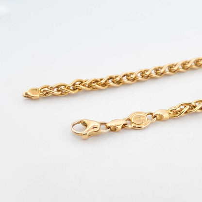 Cadena de oro amarillo de 18kt de cordón con eslabones palmera. La cadena mide 52,4cm de largo y 3,9mm de grosor y dispone de un cierre tipo mosquetón. Cadenas oro baratas