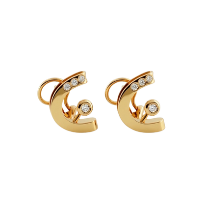 Comprar pendientes de oro amarillo de 18kt y con 4 diamantes en cada pendiente, con cierre omega. Joyería compro oro en Barcelona y Mataró, dónde vender oro al mejor precio.