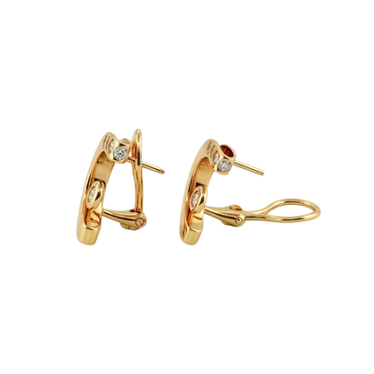 Comprar pendientes de oro amarillo de 18kt y con 4 diamantes en cada pendiente, con cierre omega. Joyería compro oro en Barcelona y Mataró, dónde vender oro al mejor precio.