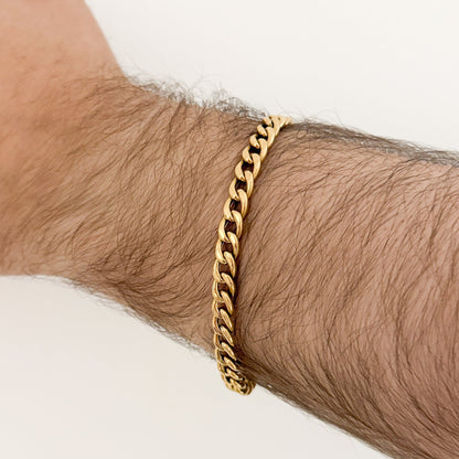 Comprar pulsera oro amarillo de 18kt con cadena tipo cubana. La pulsera mide 22,6cm de largo y 6,42mm de grosor. Joyas al mejor precio en Barcelona. Ian'Or.