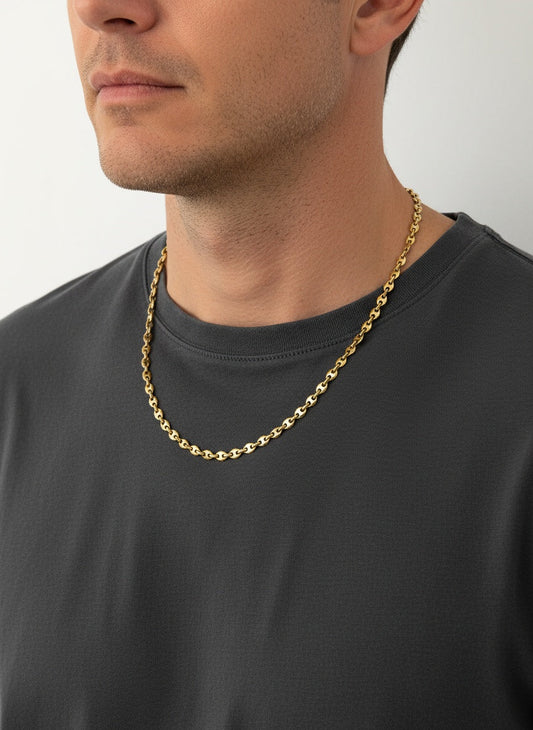 Collar de oro amarillo de 18kt de cadena de calabrote. La cadena mide 50cm de largo y tiene un grosor de 5mm. Dispone de un cierre tipo mosquetón. Ian'Or.

