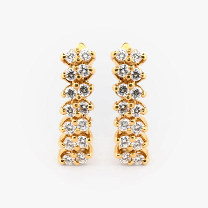 Comprar pendientes de oro amarillo de 18kt con 14 diamante en cada pendiente. Estos pendientes disponen de cierre omega.Joyas de segunda mano. Joyas restauradas. Envío gratis.