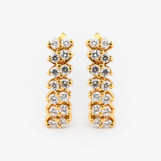 Comprar pendientes de oro amarillo de 18kt con 14 diamante en cada pendiente. Estos pendientes disponen de cierre omega.Joyas de segunda mano. Joyas restauradas. Envío gratis.