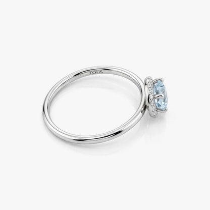 Comprar anillo en oro blanco de 18kt de la firma Tous con un Topacio central y rosetón de diamantes talla brillante alrededor. Joyas Tous baratas. Joyas restauradas.