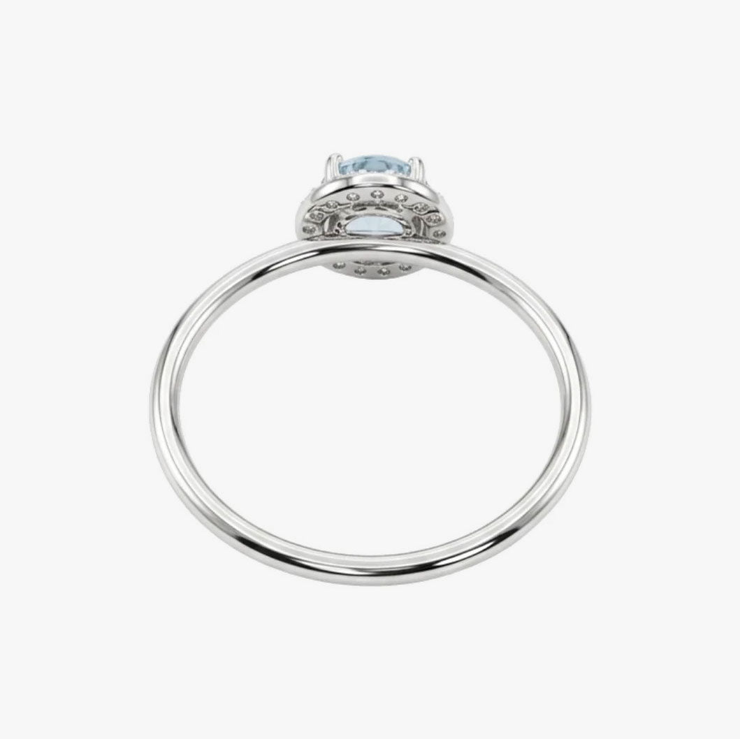 Comprar anillo en oro blanco de 18kt de la firma Tous con un Topacio central y rosetón de diamantes talla brillante alrededor. Joyas Tous baratas. Joyas restauradas.