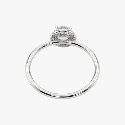 Comprar anillo en oro blanco de 18kt de la firma Tous con un Topacio central y rosetón de diamantes talla brillante alrededor. Joyas Tous baratas. Joyas restauradas.