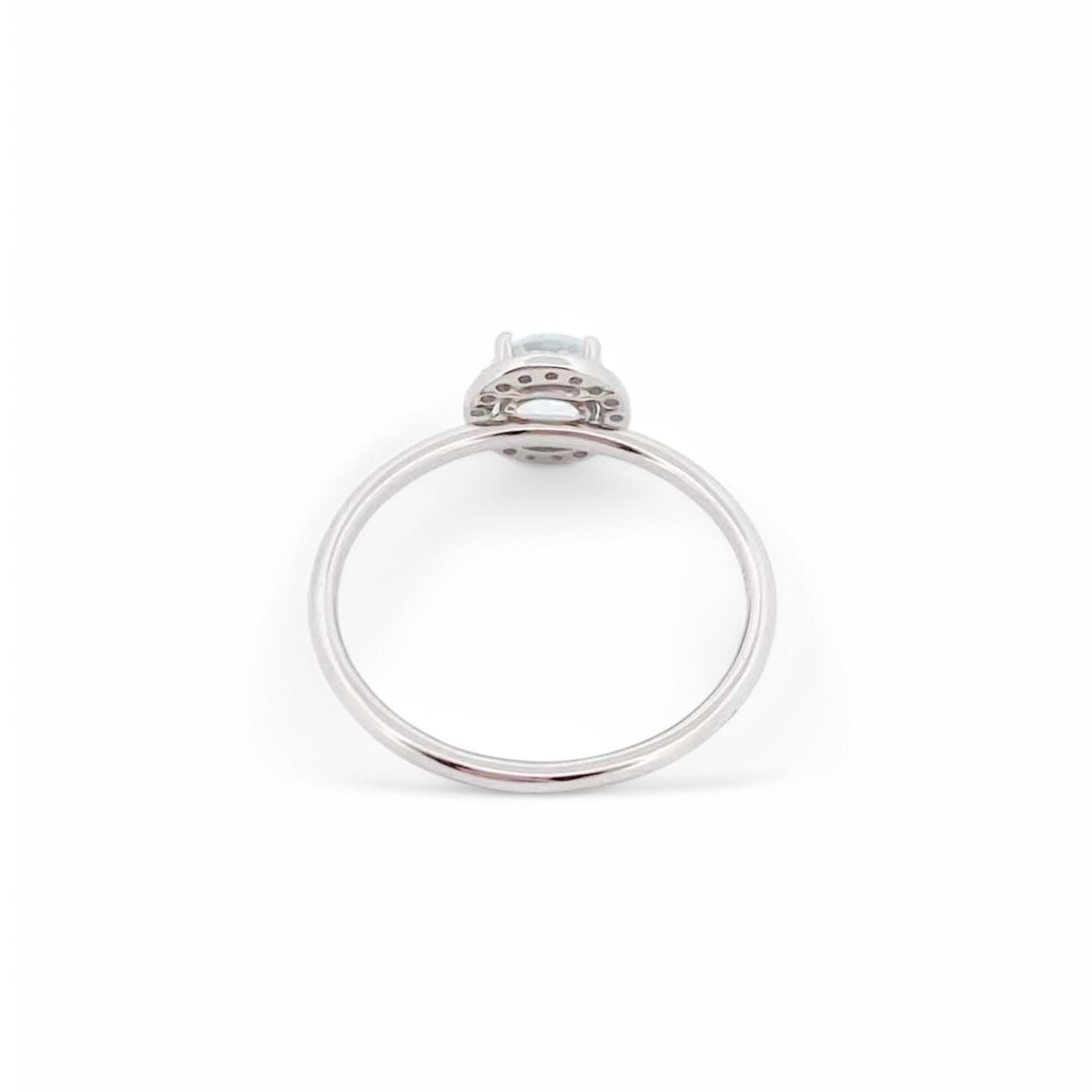 Comprar anillo en oro blanco de 18kt de la firma Tous con un Topacio central y rosetón de diamantes talla brillante alrededor. Joyas Tous baratas. Joyas restauradas.