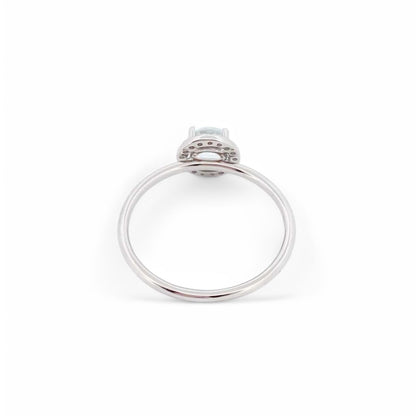 Comprar anillo en oro blanco de 18kt de la firma Tous con un Topacio central y rosetón de diamantes talla brillante alrededor. Joyas Tous baratas. Joyas restauradas.