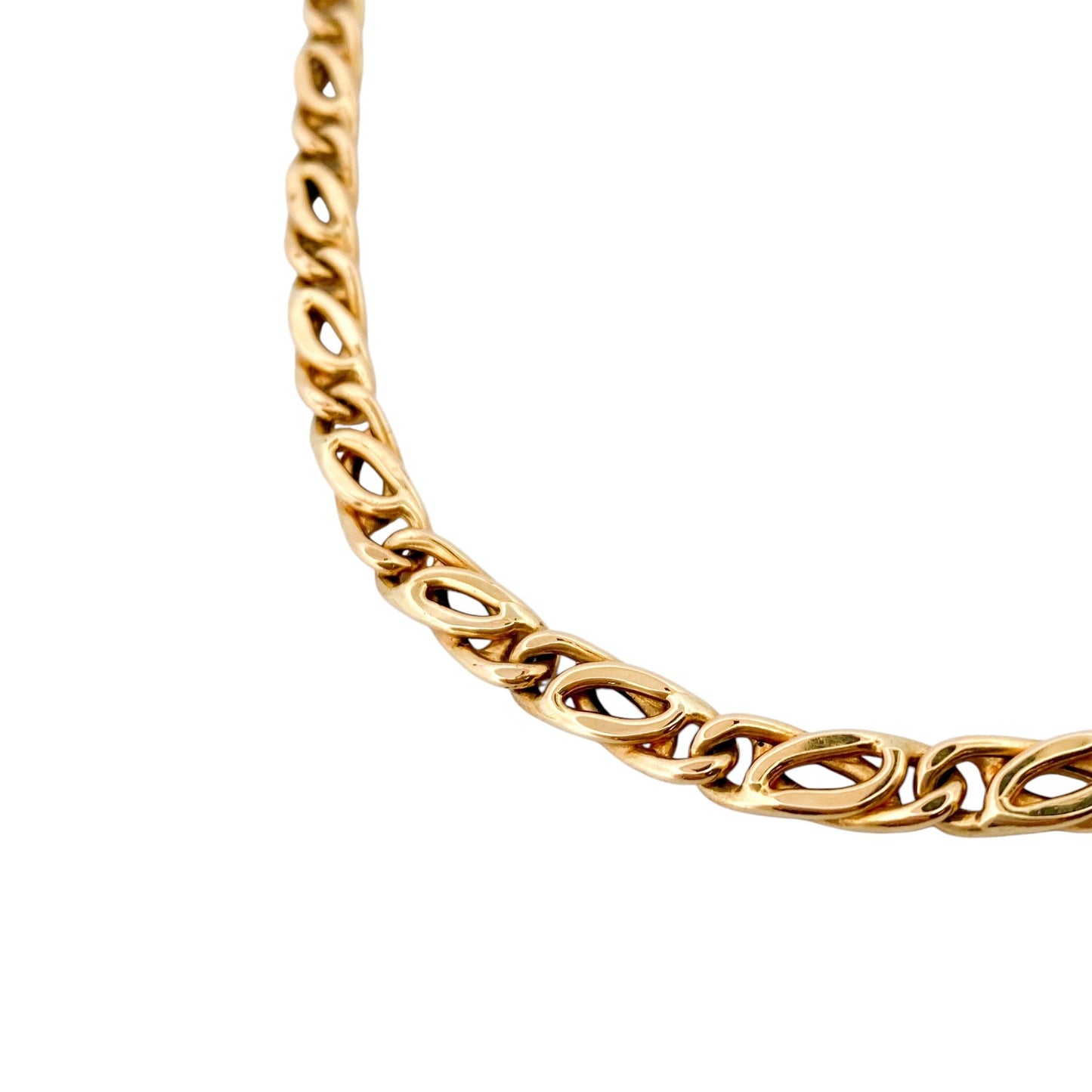 Comprar cadena realizada en oro amarillo de 18kt con eslabones ojo de tigre y cierre tipo mosquetón. Joyas restauradas. Cadenas de oro de 18kt. Joyería Ian'Or.