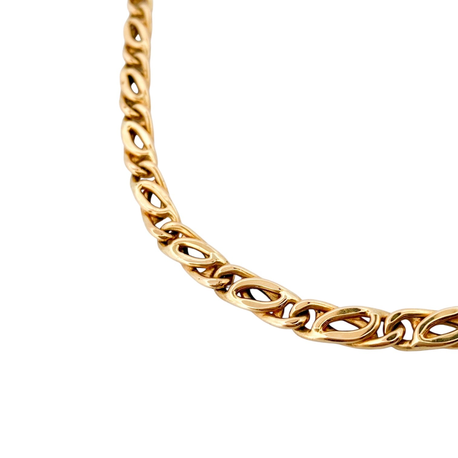 Comprar cadena realizada en oro amarillo de 18kt con eslabones ojo de tigre y cierre tipo mosquetón. Joyas restauradas. Cadenas de oro de 18kt. Joyería Ian'Or.